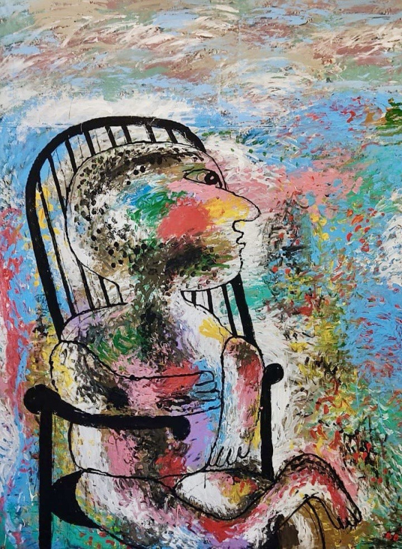 Мужчина в кресле